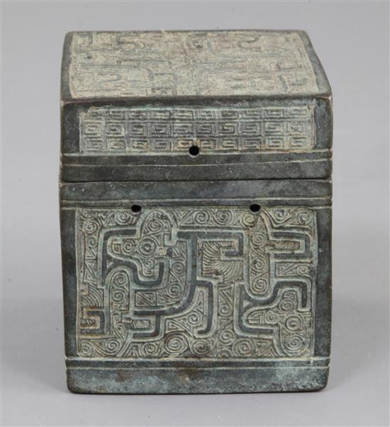 A Chinese archaic bronze square box and cover, Eastern Zhou dynasty, 6th-5th century B.C., 9.3cm high